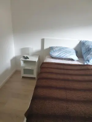 Ein Bett oder Betten in einem Zimmer der Unterkunft Am Schloss