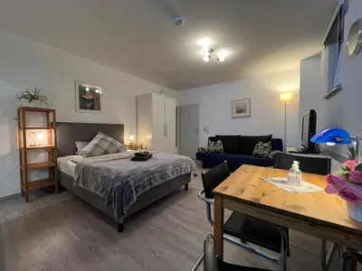 Ein Bett oder Betten in einem Zimmer der Unterkunft Einzigartiges Apartment in toller Altstadt by Rabe - Smart-TV, Netflix, Innenhof
