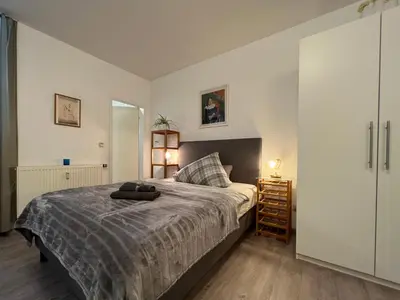 Ein Bett oder Betten in einem Zimmer der Unterkunft Einzigartiges Apartment in toller Altstadt by Rabe - Smart-TV, Netflix, Innenhof