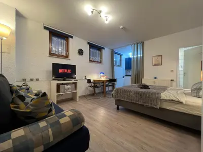 Ein Sitzbereich in der Unterkunft Einzigartiges Apartment in toller Altstadt by Rabe - Smart-TV, Netflix, Innenhof