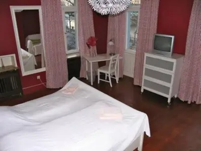 Ein Bett oder Betten in einem Zimmer der Unterkunft Hemingway`s Heidelberg Hostel