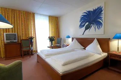 Ein Bett oder Betten in einem Zimmer der Unterkunft Regina