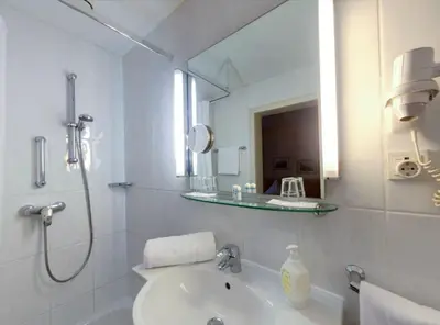 Ein Badezimmer in der Unterkunft Regina
