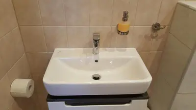 Ein Badezimmer in der Unterkunft Hotel Exquisite