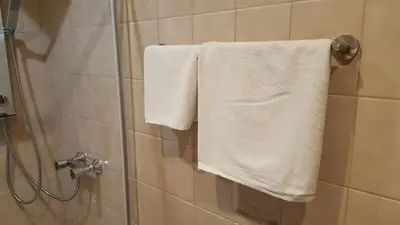 Ein Badezimmer in der Unterkunft Hotel Exquisite