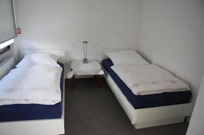 Ein Bett oder Betten in einem Zimmer der Unterkunft C+U Ferienwohnungen