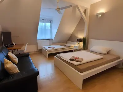 Ein Bett oder Betten in einem Zimmer der Unterkunft ApartInn