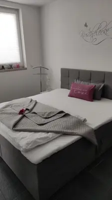 Ein Bett oder Betten in einem Zimmer der Unterkunft FeWo ALBTALECK - Wohnen im Kurort Waldbronn