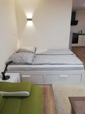 Ein Bett oder Betten in einem Zimmer der Unterkunft Wohnung im Erdgeschoss