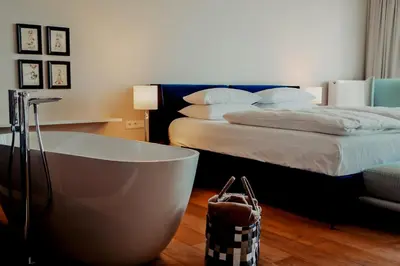Ein Bett oder Betten in einem Zimmer der Unterkunft Hotel Villa Toskana