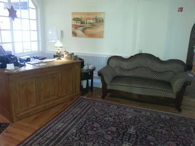 Ein Sitzbereich in der Unterkunft Hotel Blaues Haus