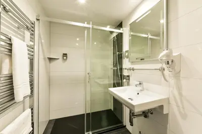 Ein Badezimmer in der Unterkunft City Hotel Heilbronn