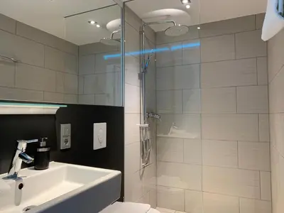 Ein Badezimmer in der Unterkunft Gemütliches Apartment by Rabe - Parkplatz, Smart-TV, Netflix