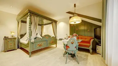 Ein Bett oder Betten in einem Zimmer der Unterkunft Wellness-Hotel Talblick
