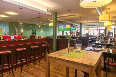 Ein Restaurant oder anderes Speiselokal in der Unterkunft Sporthotel Öhringen