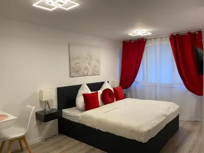 Ein Bett oder Betten in einem Zimmer der Unterkunft Prime Host Sophie Apartments