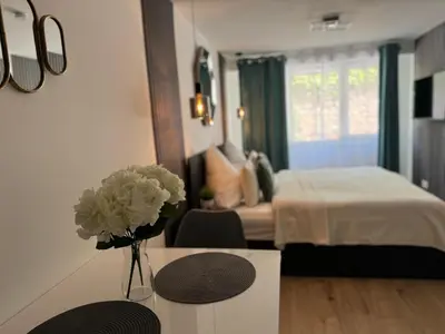 Ein Bett oder Betten in einem Zimmer der Unterkunft Prime Host Sophie Apartments