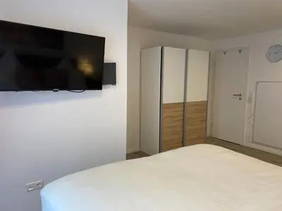 Ein Bett oder Betten in einem Zimmer der Unterkunft Prime Host Sophie Apartments