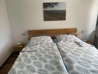 Ein Bett oder Betten in einem Zimmer der Unterkunft Gästehaus Jagsttal