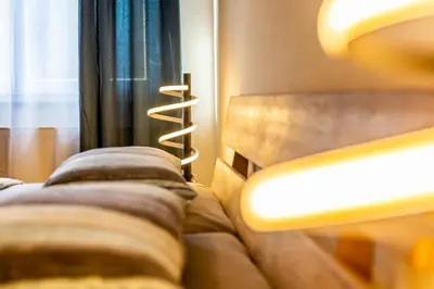 Ein Bett oder Betten in einem Zimmer der Unterkunft Gästehaus Jagsttal