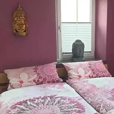 Ein Bett oder Betten in einem Zimmer der Unterkunft Schlafwelt - Thailand
