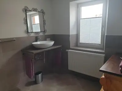 Ein Badezimmer in der Unterkunft Schlafwelt - Thailand