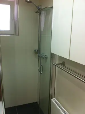 Ein Badezimmer in der Unterkunft Joanna Apartment - MA Rheinau 3