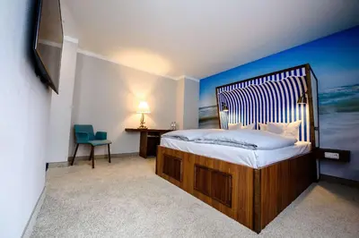 Ein Bett oder Betten in einem Zimmer der Unterkunft Dorint Hotel Alzey/Worms
