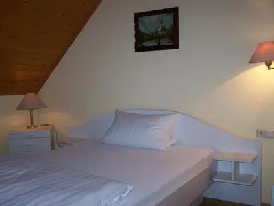 Ein Bett oder Betten in einem Zimmer der Unterkunft Gasthof Engel Steinbach