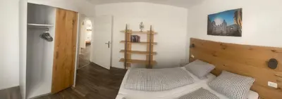 Ein Bett oder Betten in einem Zimmer der Unterkunft Ferienwohnung EG Heppenheim