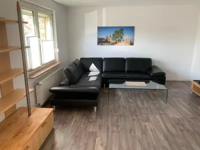 Ein Sitzbereich in der Unterkunft Ferienwohnung EG Heppenheim