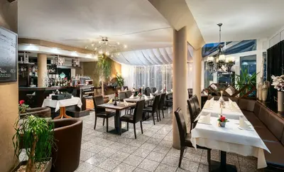 Ein Restaurant oder anderes Speiselokal in der Unterkunft Sunibel Inn