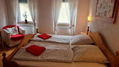 Ein Bett oder Betten in einem Zimmer der Unterkunft Hotel Kartäuser Hof Mainz Bodenheim