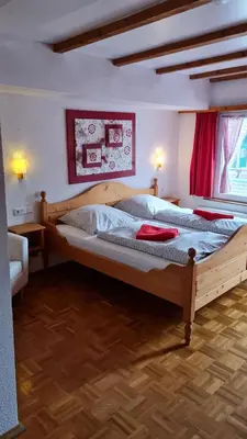Ein Bett oder Betten in einem Zimmer der Unterkunft Hotel Kartäuser Hof Mainz Bodenheim