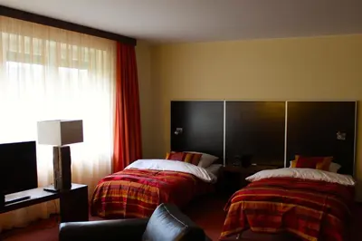 Ein Bett oder Betten in einem Zimmer der Unterkunft Hotel Donnersberg