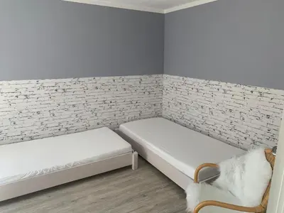 Ein Bett oder Betten in einem Zimmer der Unterkunft Joanna Apartment - Weinheim