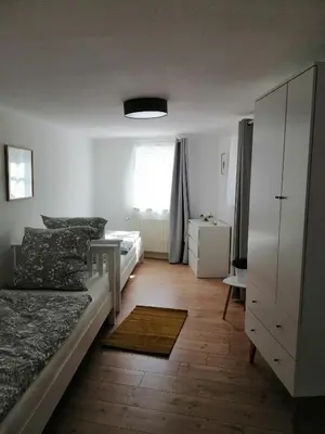 Ein Bett oder Betten in einem Zimmer der Unterkunft Ferienwohnung Benz