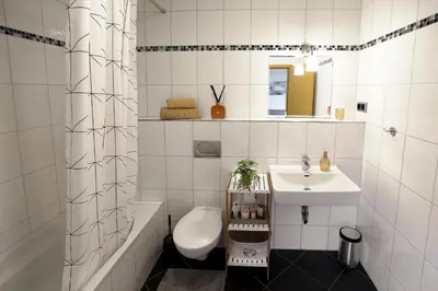 Ein Badezimmer in der Unterkunft Boardinghouse am Rosensee