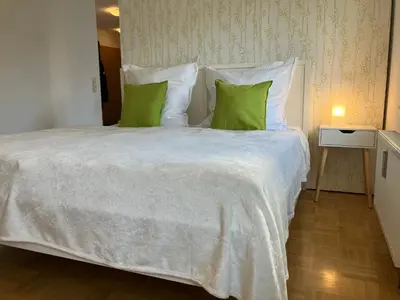 Ein Bett oder Betten in einem Zimmer der Unterkunft Ferienwohnung-Ludwigsburg-City