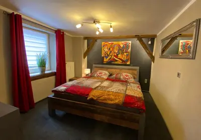 Ein Bett oder Betten in einem Zimmer der Unterkunft Appartement Schlossberg, Gasthaus Hirsch