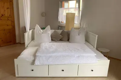 Ein Bett oder Betten in einem Zimmer der Unterkunft Ferienhaus Bärbelstein / Wohnung Bärbelstein