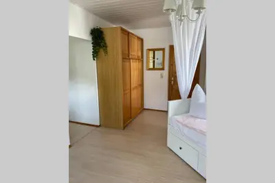 Ein Bett oder Betten in einem Zimmer der Unterkunft Ferienhaus Bärbelstein / Wohnung Bärbelstein