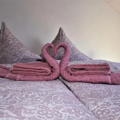 Ein Bett oder Betten in einem Zimmer der Unterkunft FeWo 4 - Erpolzheim