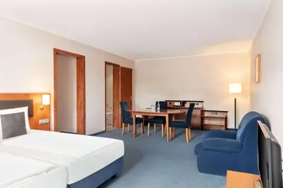 Ein Bett oder Betten in einem Zimmer der Unterkunft Amedia Frankfurt Russelsheim Trademark Collection by Wyndham