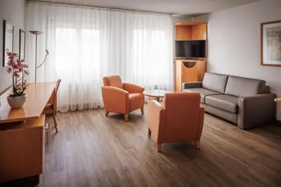Ein Sitzbereich in der Unterkunft Ariva Boardinghouse Platanenhof