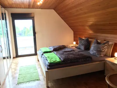 Ein Bett oder Betten in einem Zimmer der Unterkunft Ferienhaus Riesling