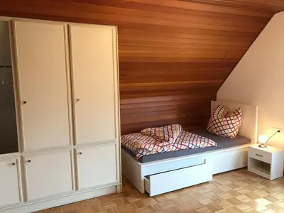 Ein Bett oder Betten in einem Zimmer der Unterkunft Ferienhaus Riesling