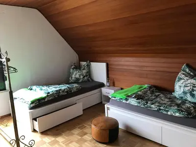 Ein Bett oder Betten in einem Zimmer der Unterkunft Ferienhaus Riesling