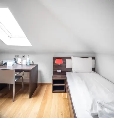 Ein Bett oder Betten in einem Zimmer der Unterkunft BoardingWorld Heidelberg
