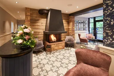 Ein Sitzbereich in der Unterkunft Hotel & Restaurant Grenzhof